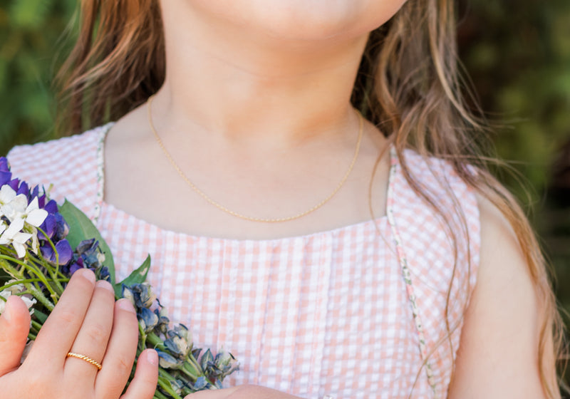 Girl wearing 14K Gold-Plated Rolo Chain for Kids, Teens or Women